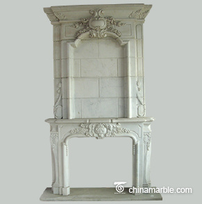 Grandly carved marble fireplace