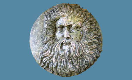 Neptune face marble relief