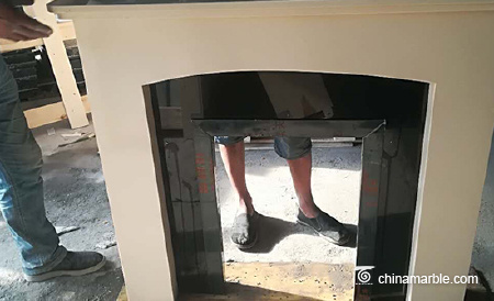 Marble and stone fireplace mantel