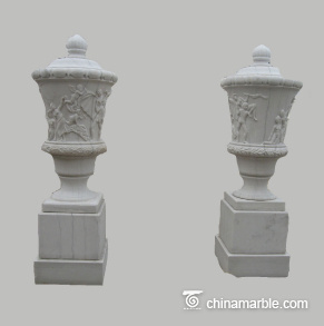 Carved-urn-with-pedestal-